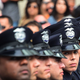 Police recruits attend their graduation ceremony at LAPD headquarters where rappers Snoop Dogg and the Game led a peaceful demonstration outside on July 8, 2016.
FREDERIC J. BROWN/AFP/Getty Images